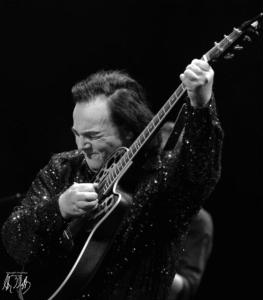 Will Chalmers performing live – Neil Diamond tribute artist on stage